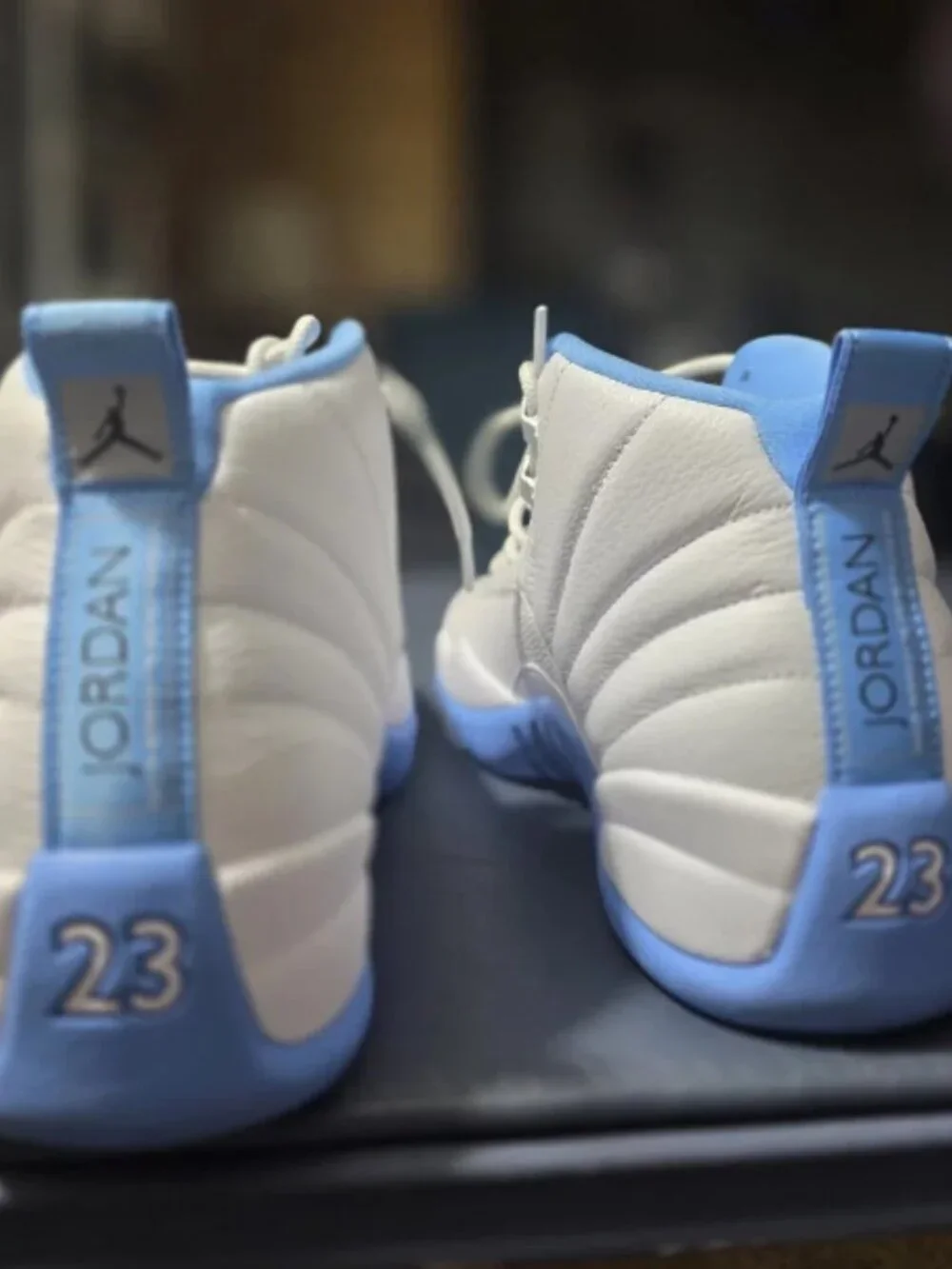 Jordan 12 Retro Melo White and Light Blue Sneakers